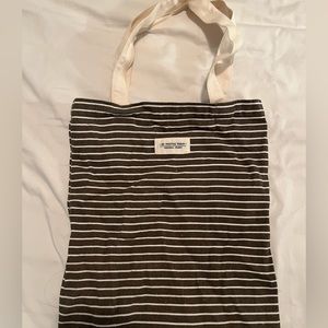 FREE WITH PURCHASE OF TWO ITEMS OR MORE BROWN STRIPED BAG